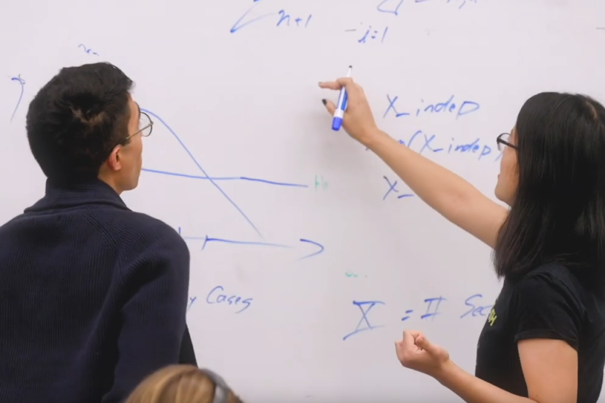Image of Assistant Professor Zach del Rosario ’14 working on ModSim with student Image of Assistant Professor Zach del Rosario ’14 working on ModSim with student