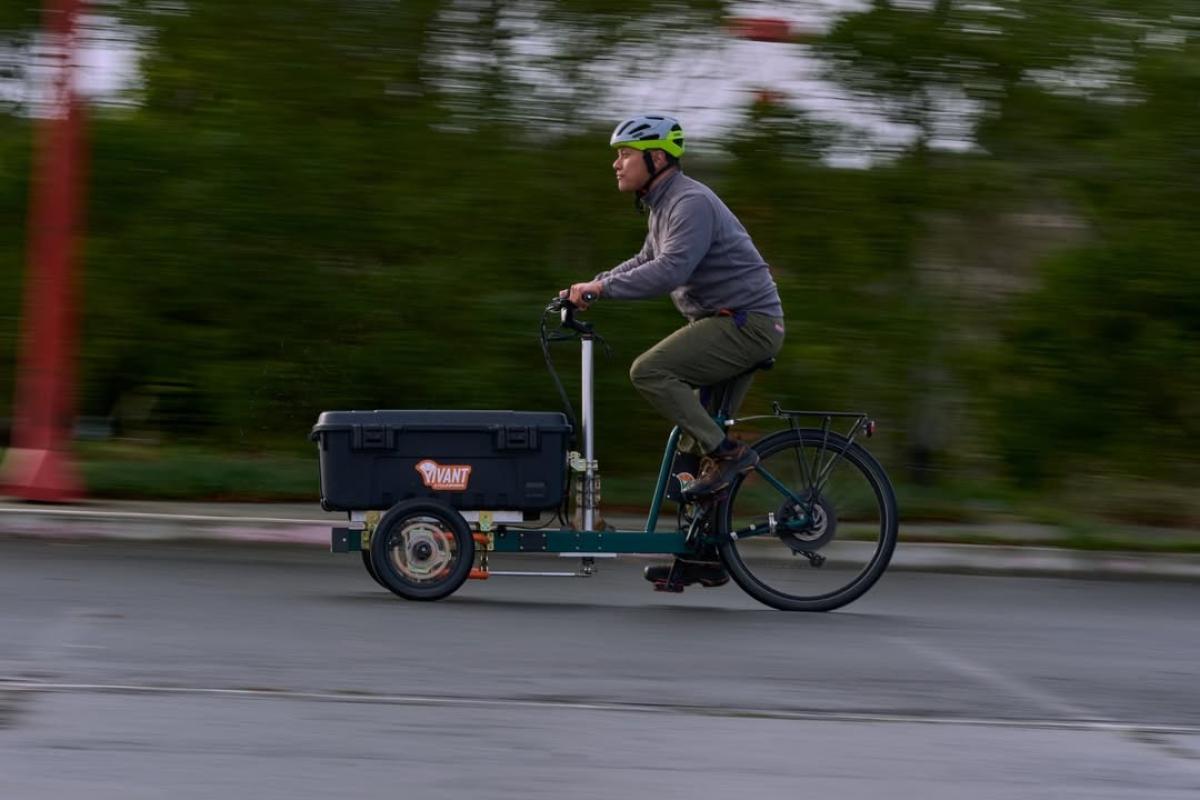 James Nee '15 is shown riding Vivant's cargo e-bike, Juno. Photo by Sean Lowen '16.