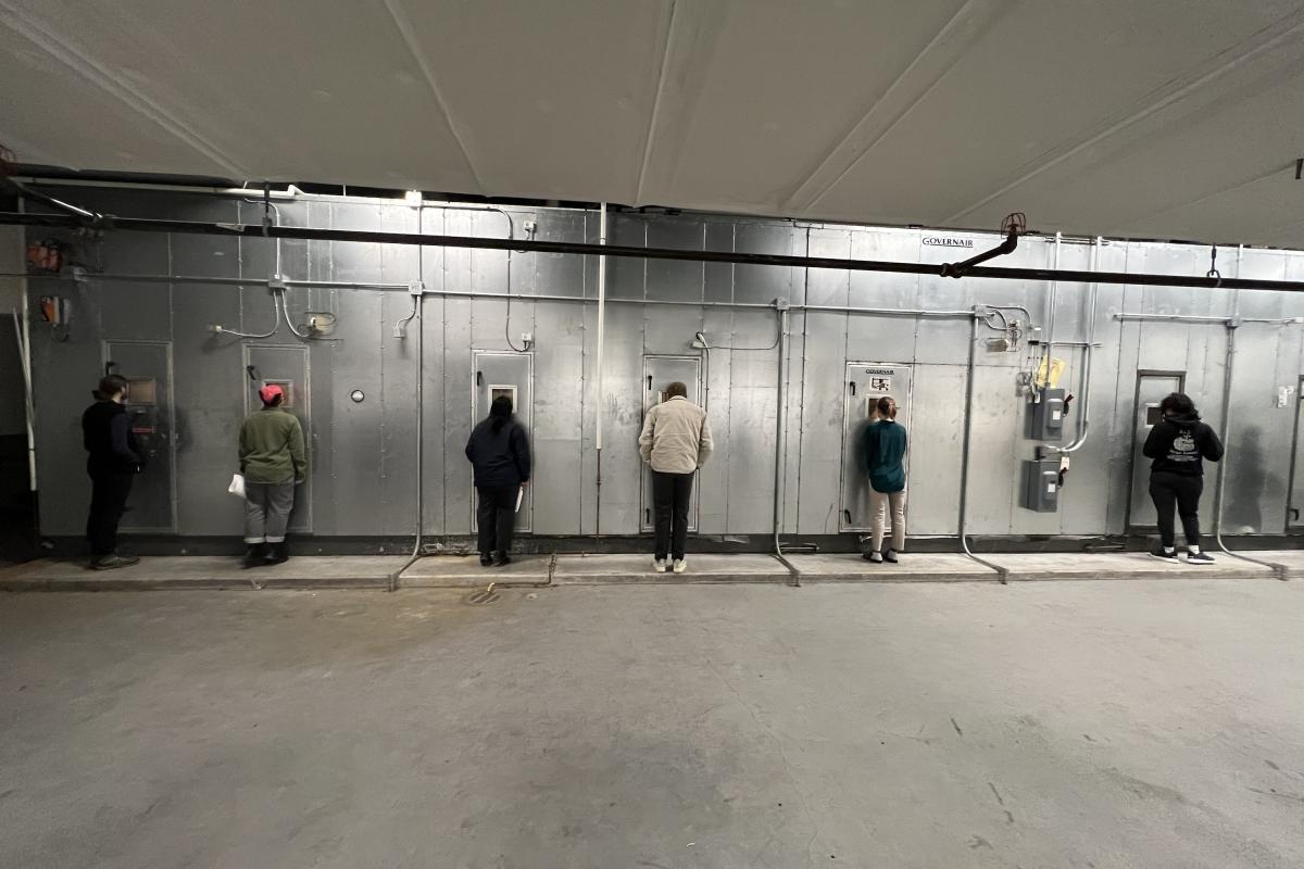Students looking at HVAC system Students looking at HVAC system