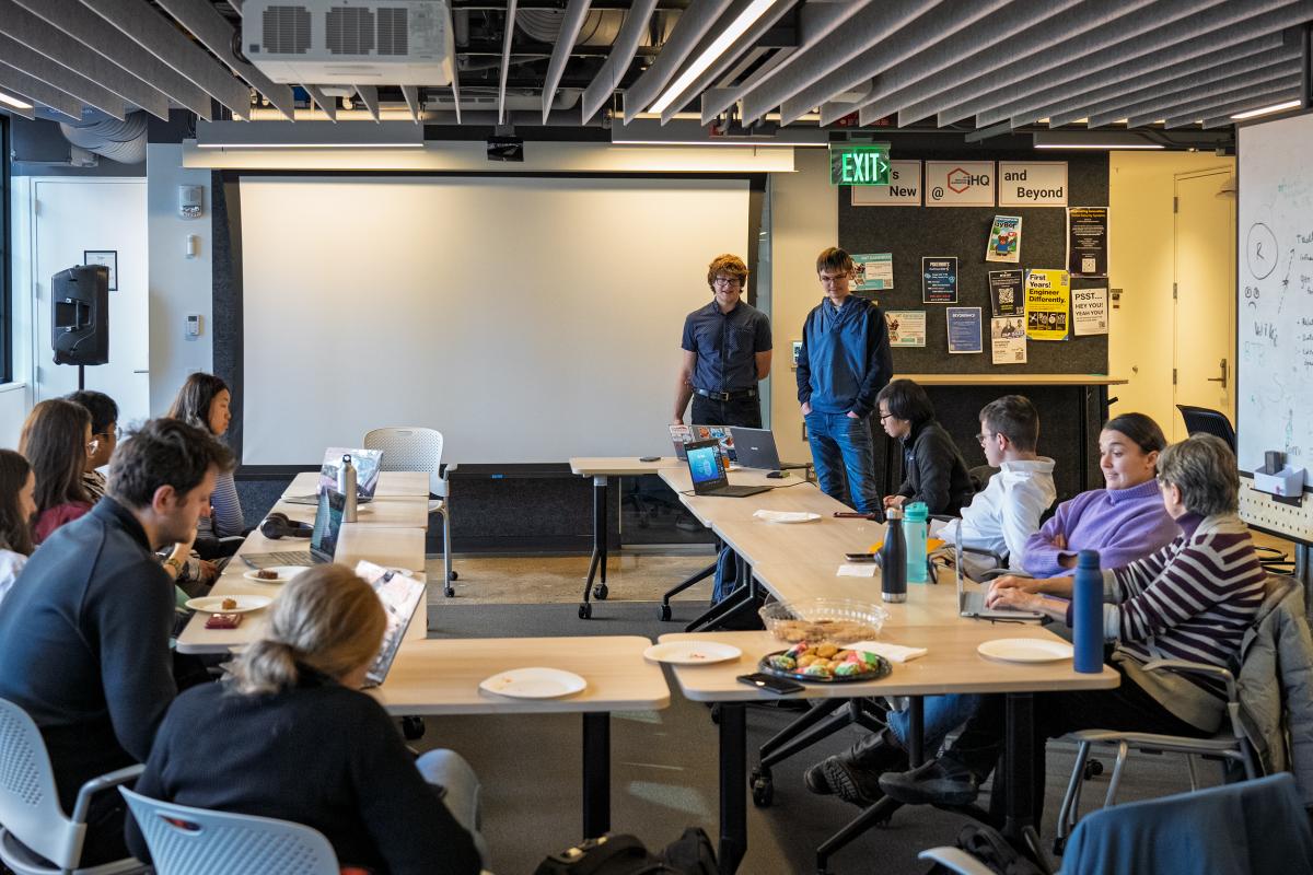 Timur Gray '28 presents at a recent MIT-sponsored buildathon for Ukraine.