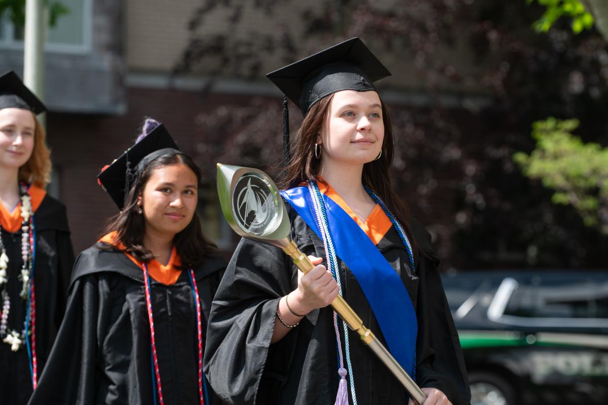 An Olin College Class of 2025 graduate leads the Commencement procession on May 16, 2025. 