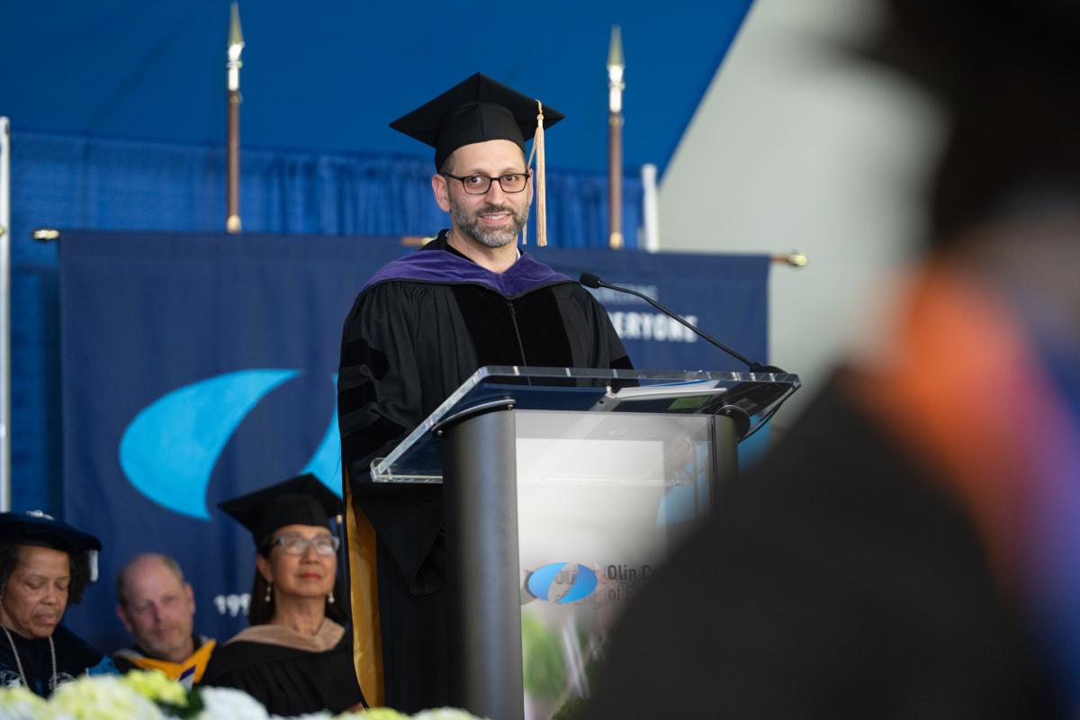 Tom Cecil '06, Alumni Speaker, speaks at the podium during Commencement exercises on May 16, 2025. Tom Cecil '06, Alumni Speaker, speaks at the podium during Commencement exercises on May 16, 2025.
