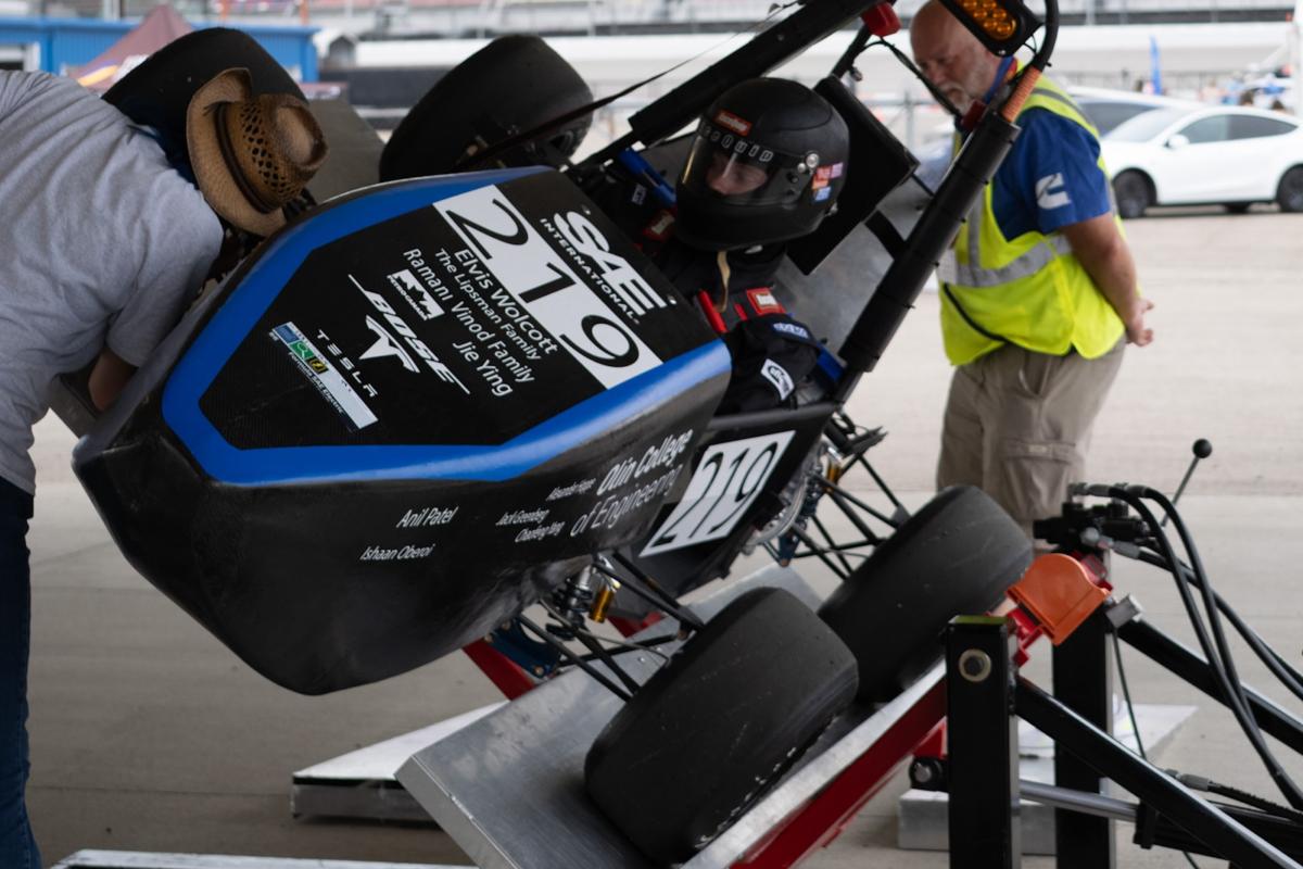 OEM’s MK VII car is seen doing the tilt test where the car is tilted 60 degrees from horizontal with a driver inside to make sure the car’s center of gravity is low enough to prevent the car from rolling. OEM’s MK VII car is seen doing the tilt test where the car is tilted 60 degrees from horizontal with a driver inside to make sure the car’s center of gravity is low enough to prevent the car from rolling.