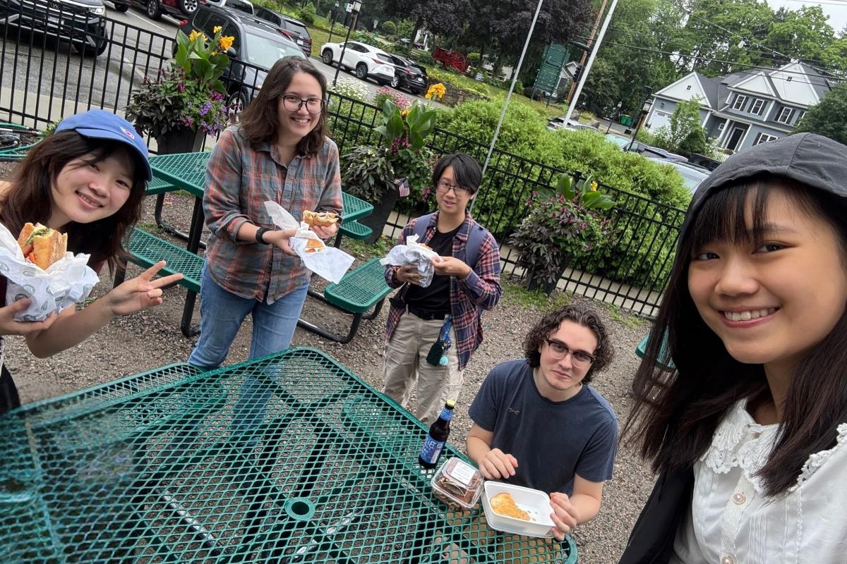 Members of the CREST Lab enjoy a bite to eat. Members of the CREST Lab enjoy a bite to eat.