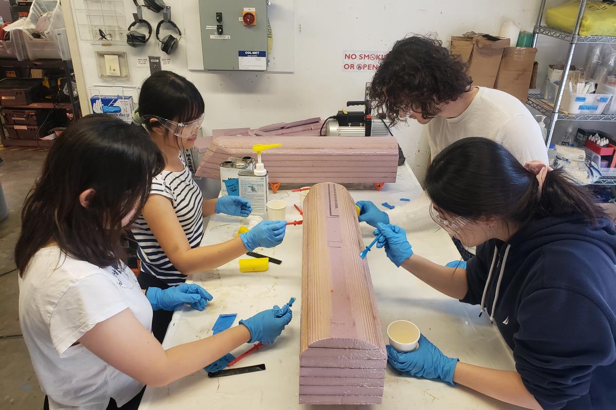 Four of the Olin CREST Lab students work during the early stages of preparing the vessel. Four of the Olin CREST Lab students work during the early stages of preparing the vessel.