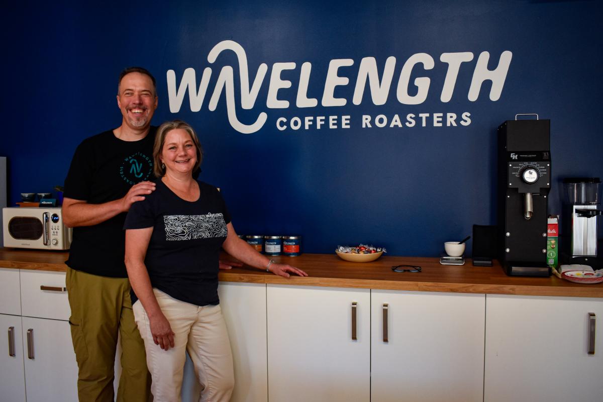 Co-founders Jim and Deanna Varney stand in front of their coffee station at Wavelength Coffee Roasters. Co-founders Jim and Deanna Varney stand in front of their coffee station at Wavelength Coffee Roasters.