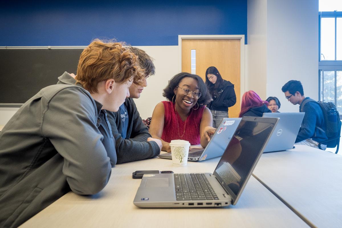 Esther Aduamah '26 (center) is shown working with fellow Oliners in a Software Design class.