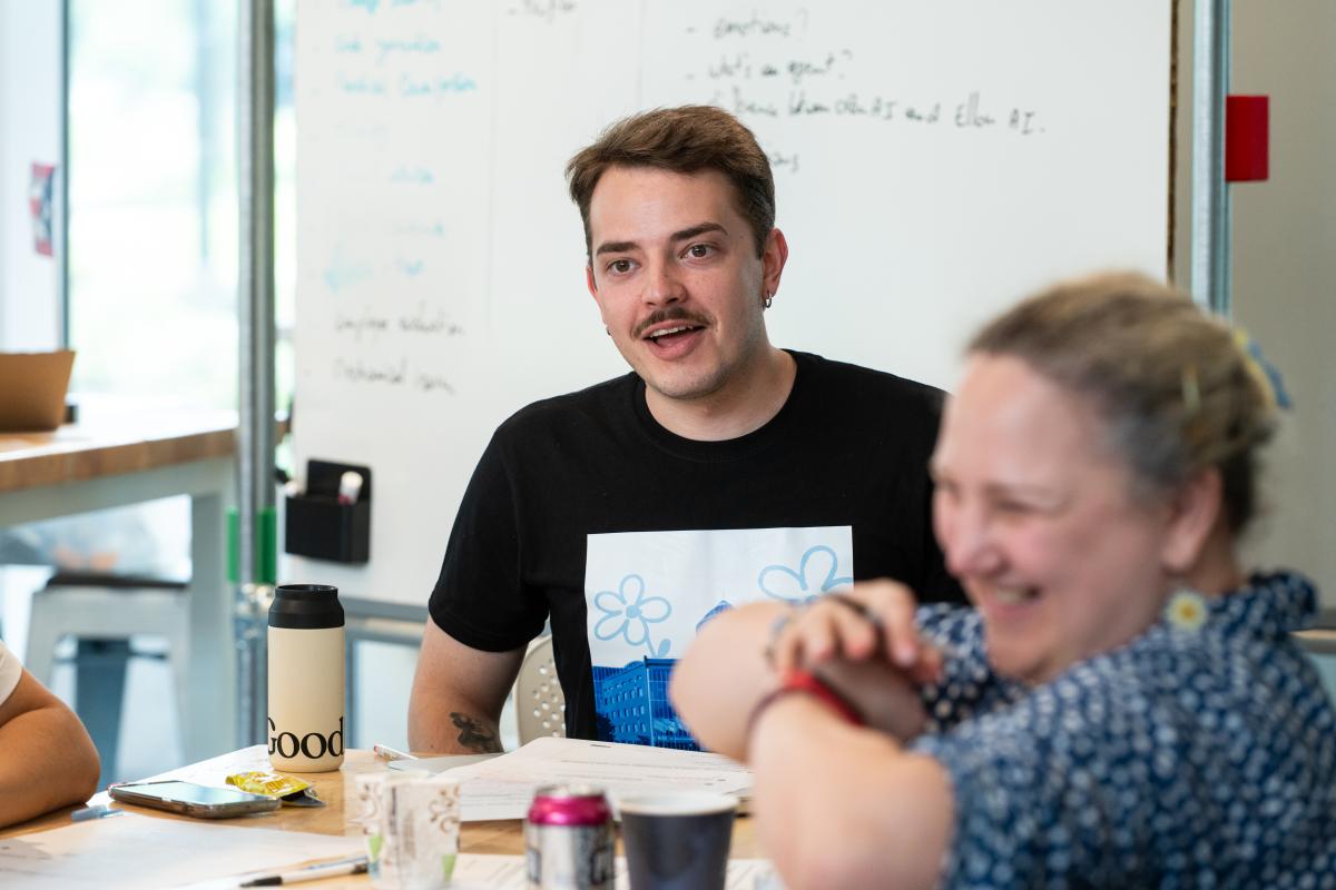 An Olin College Summer Studio 2025 participant is shown enjoying the event.
