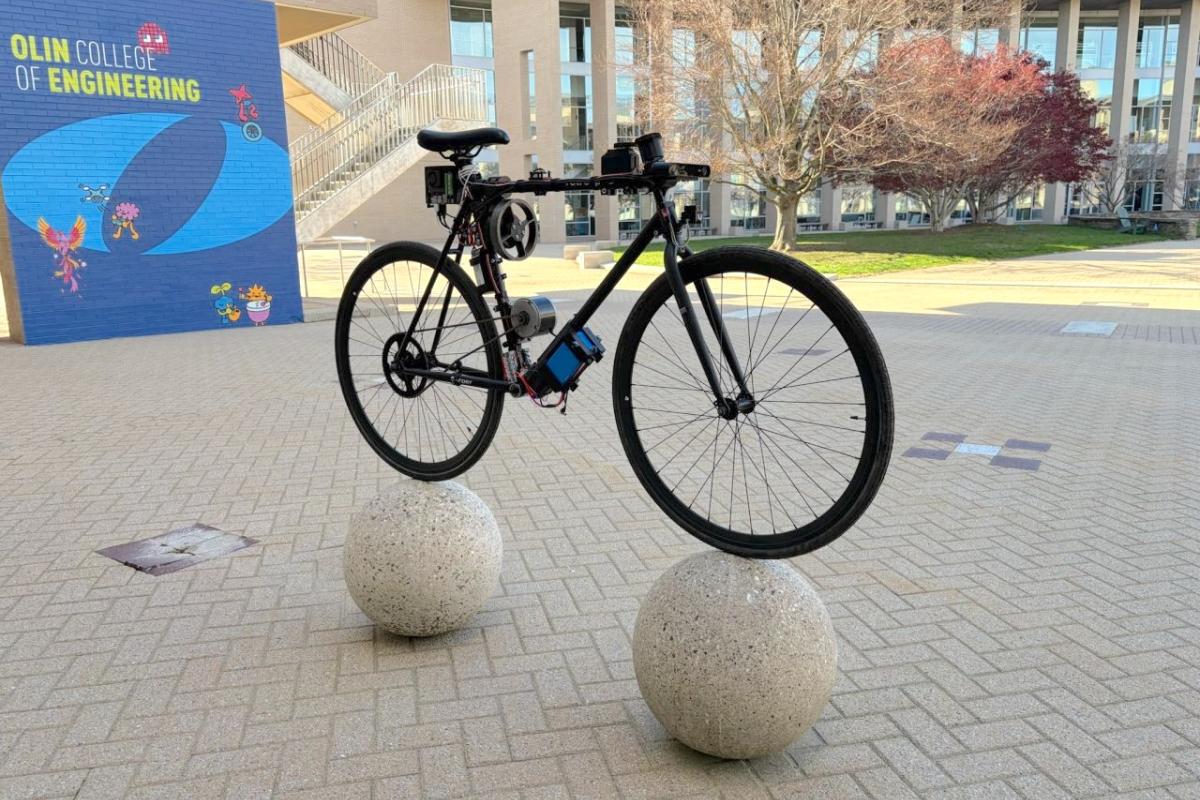 The autonomous self-balancing bicycle is shown at Olin College of Engineering