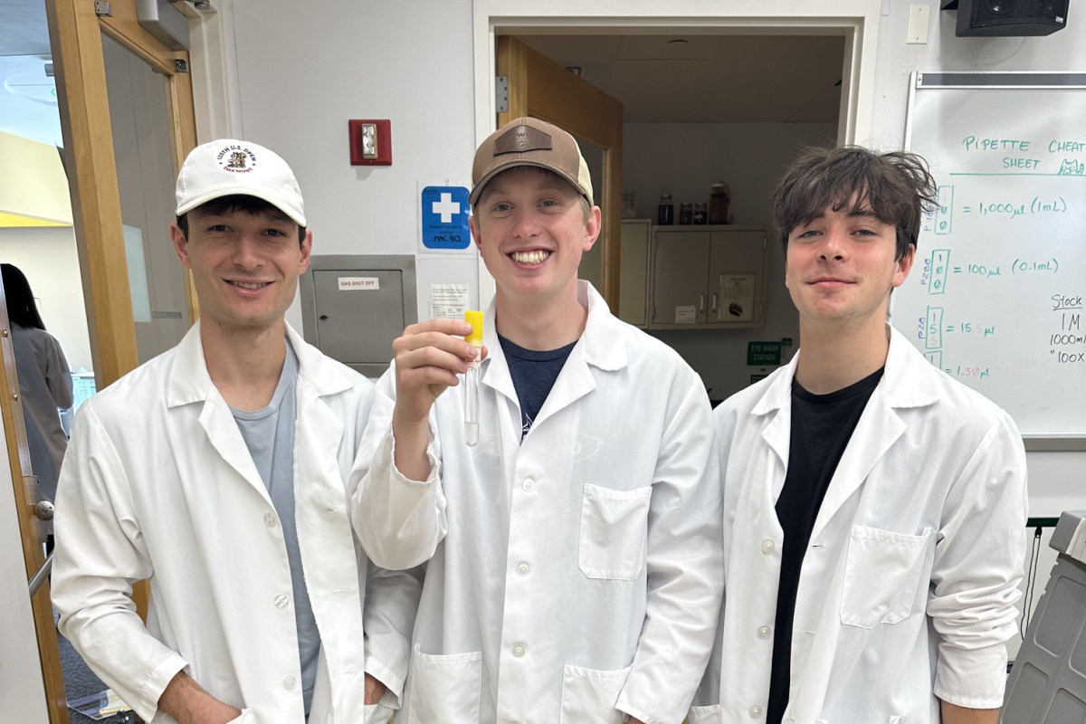 Three Microbial Diversity students pose for a group photo.