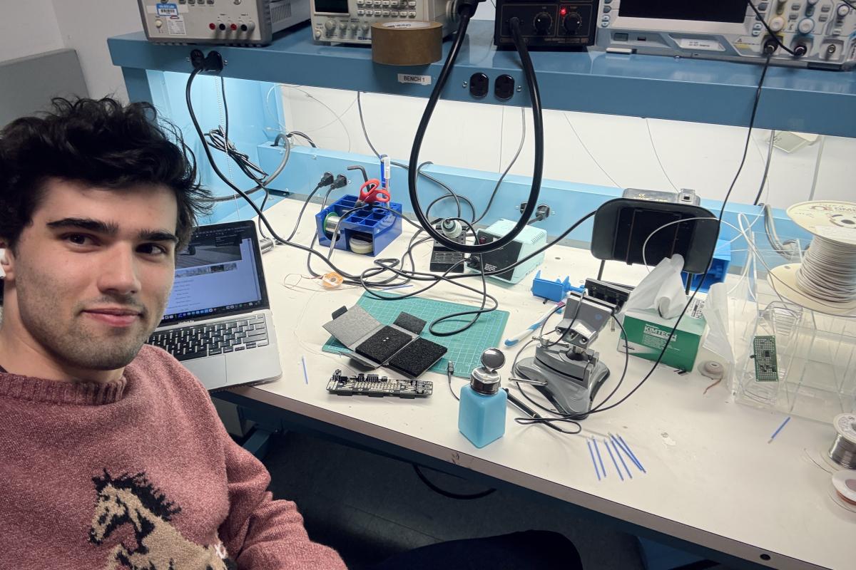 Project lead Ian Walsh '26 working on parts for the OCTAL team's drone
