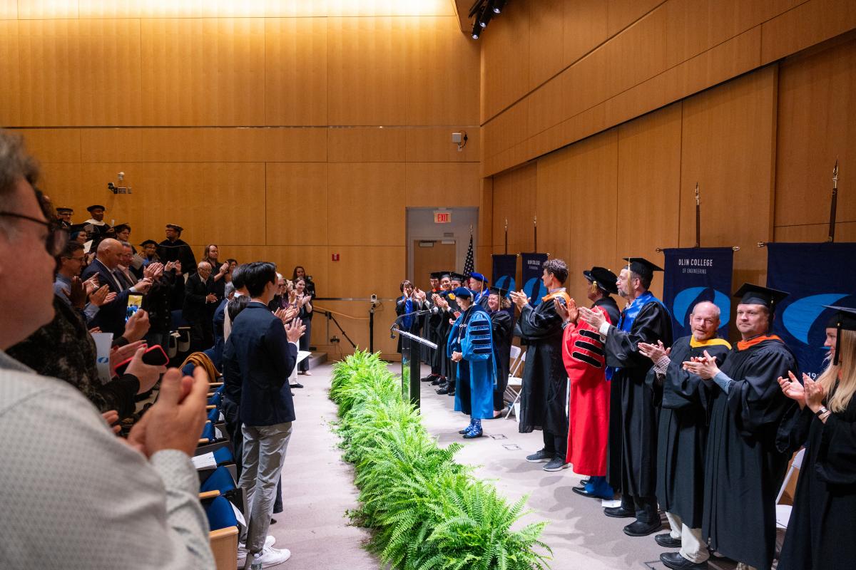 President R. May Lee receives a standing ovation after her remarks at the Inauguration ceremony. 