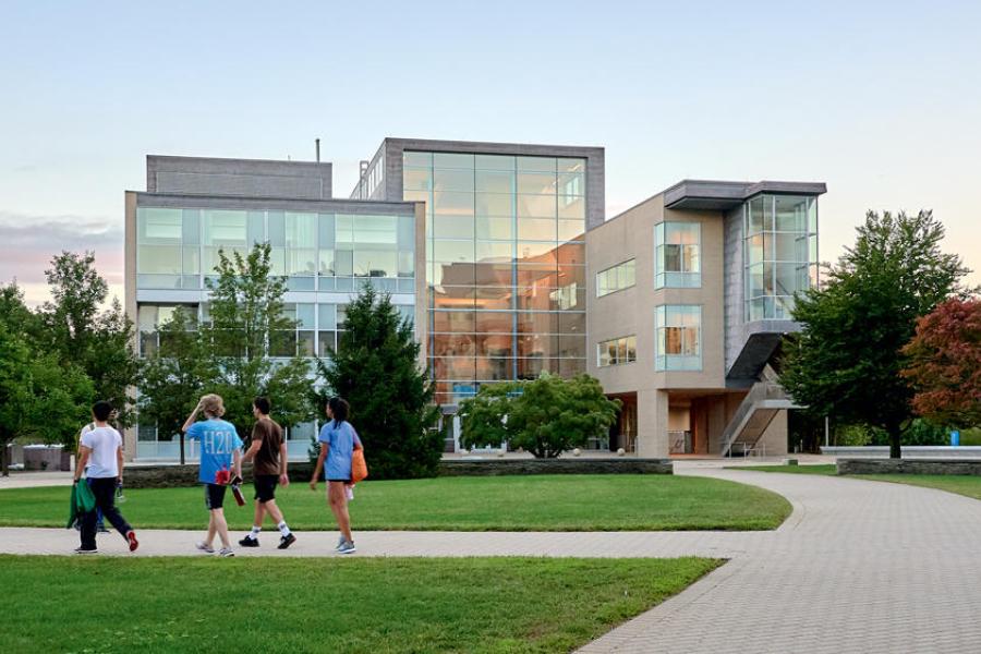 The oval lawn in front of Olin College of engineering buildings