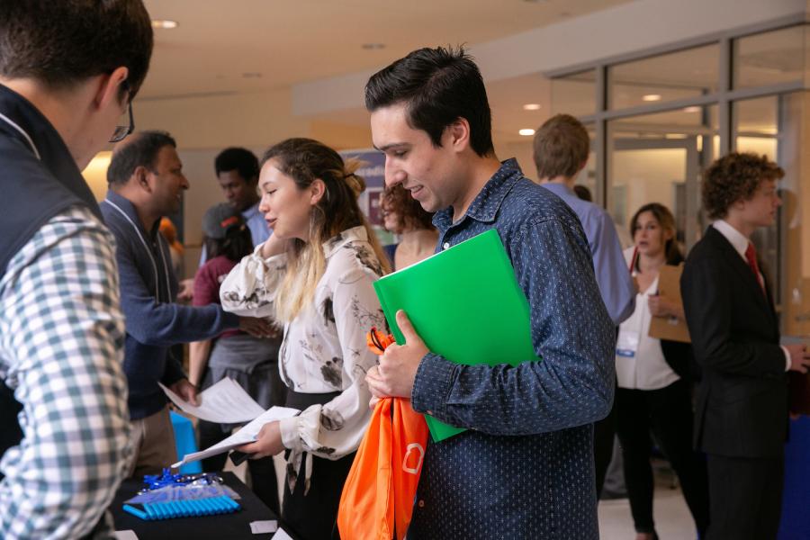 Students interact with employers during a Career Fair in 2018.