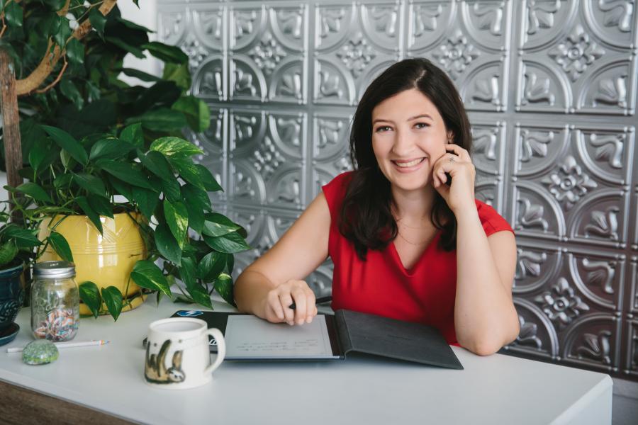 A woman sitting at a desk