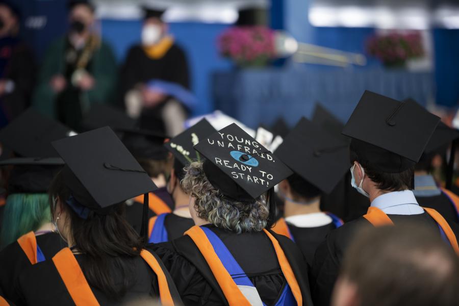 Commencement Image of students seated at commencement with their gowns