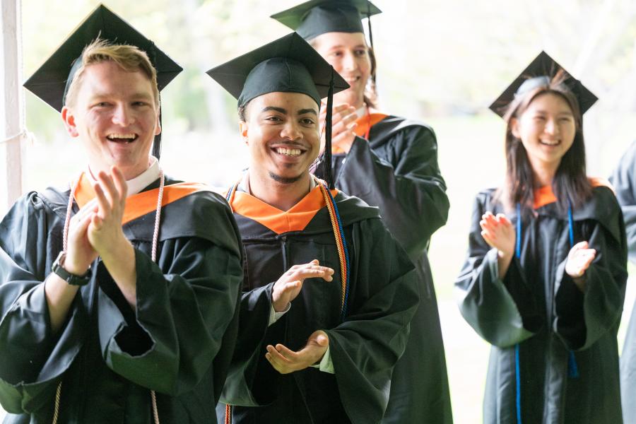 Commencement 2024 - graduating student clapping