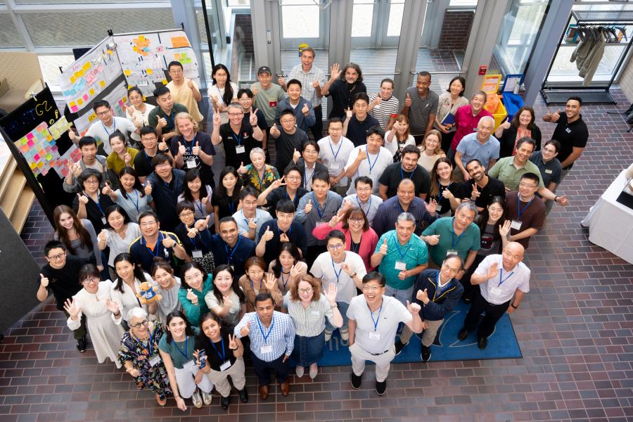 Summer Studio 2024 Group Shot Overhead photo of all summer studio participants giving a thumbs up