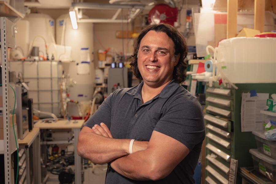 Amos Winter, Germeshausen Professor of Mechanical Engineering and Director of the K. Lisa Yang Global Engineering and Research (GEAR) Center at MIT, poses for a photo.