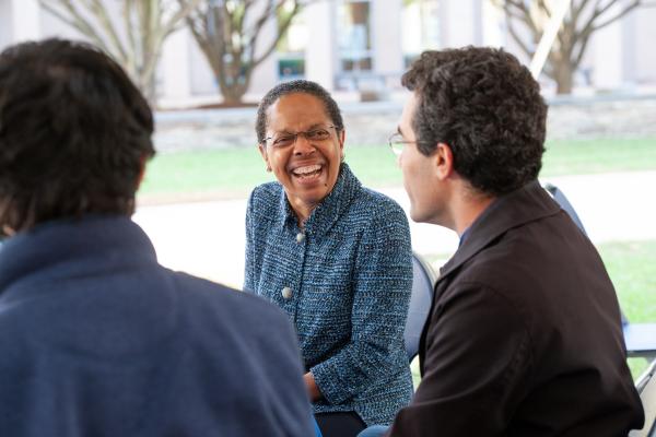 President Barabino speaking with alums during Alumni Weekend