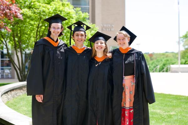 Students smiling at camera