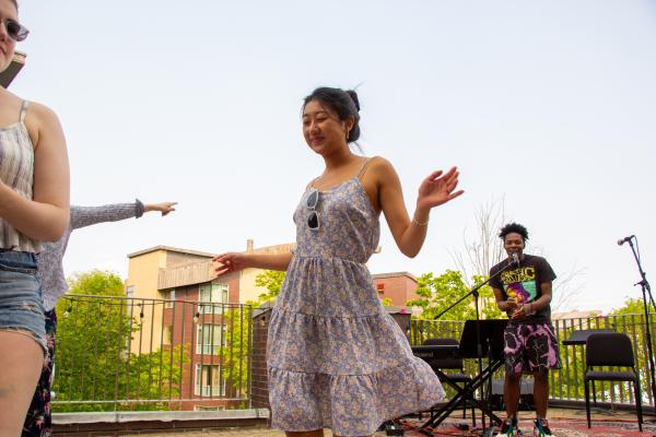 Olin student Jackie Zeng '23 dances to music on the Oval.