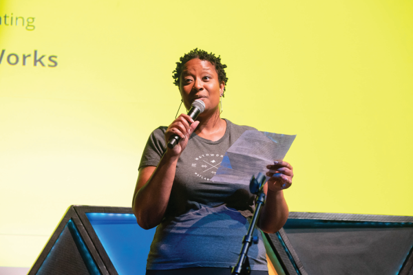 MathWorks STEM outreach engineer, Wynter Duncanson, performs at The Mirror’s STEM Slam at the Cambridge Foundry