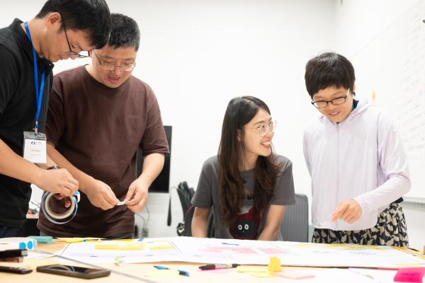 Summer Studio team of 4 finalizing activity