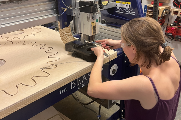 Maya setting up and utilizing the CNC machine
