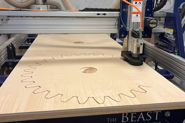 Gear being cut by CNC Machine