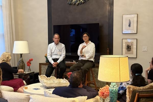 Olin College President May Lee and Al Bunshaft, Trustee, chat with attendees during the Olin on the Road trip to New York City.