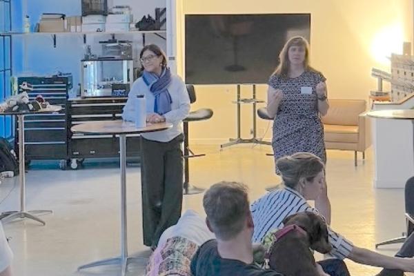 Attendees listen in as Olin College President May Lee shares updates and Olin news, while meeting alumni in San Francisco.