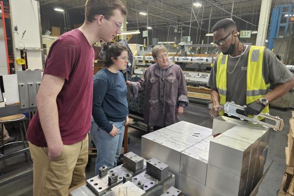 Students learning about Darco Manufacturing's process. 