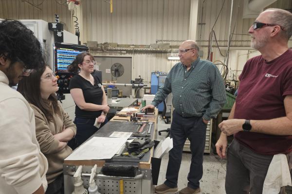 Students and Olin staff speaking with Instron team members.