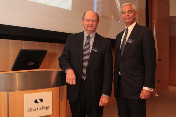 President Rick Miller and Bill Norden in 2012 at a President’s Council meeting.
