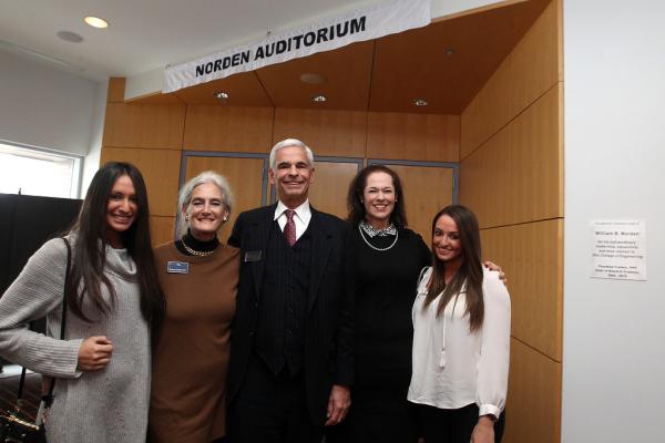 Bill Norden with his wife and daughters at the 2016 dedication of Norden Auditorium.