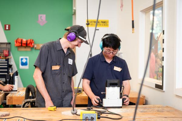 Coby Unger and a Makerspace Institute participant. 